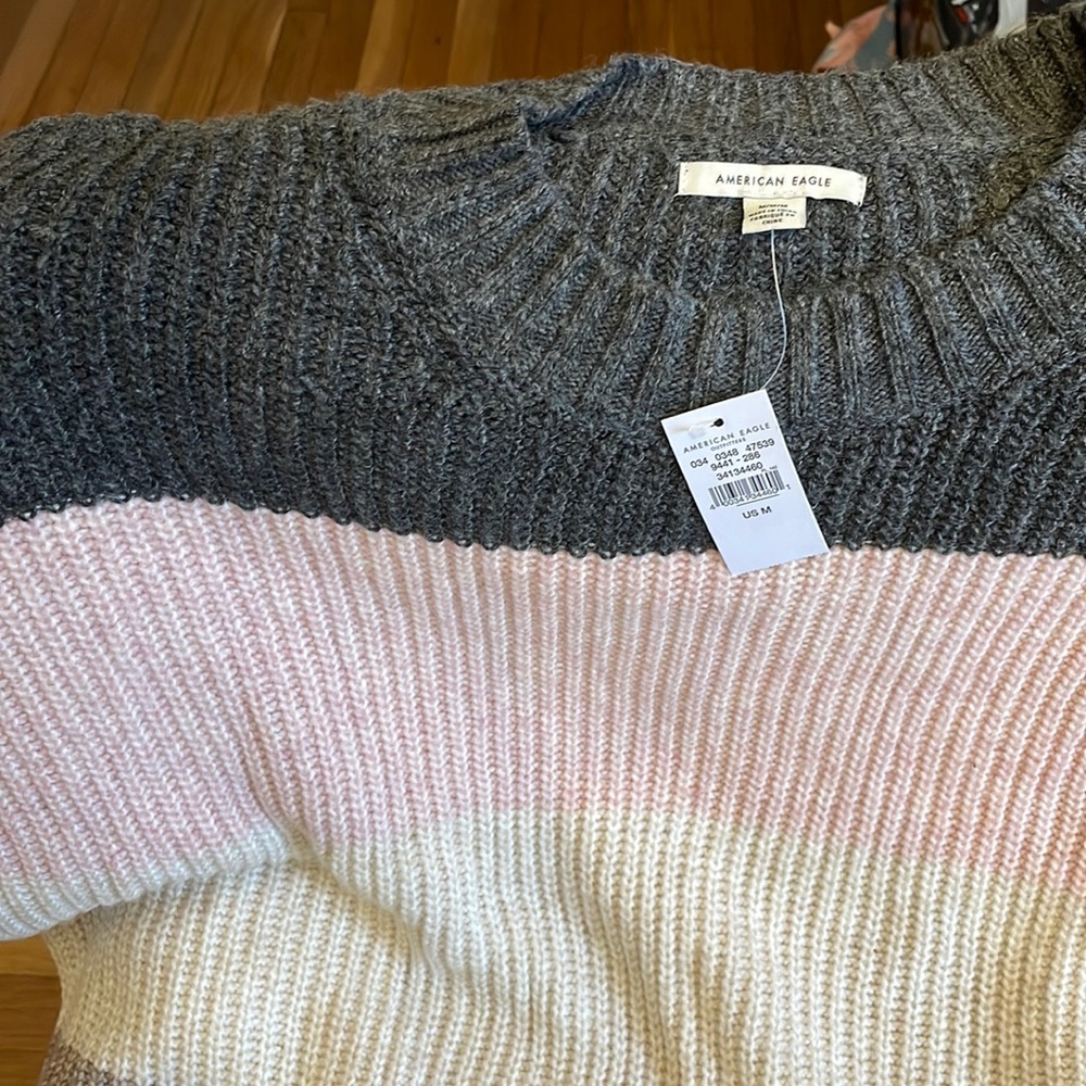 Brand new multicolor sweater. Perfect for the fall and winter